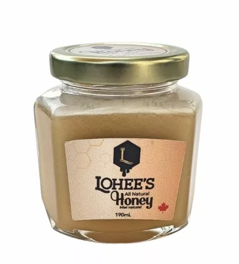 250g of raw honey in a glass jar